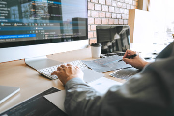 Professional Developer programmer working a software website design and coding technology, writing...