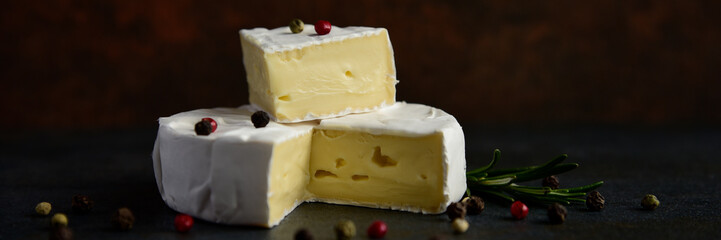 Cheese camembert or brie with fresh rosemary