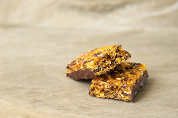 Muesli and cereal bar on marble stone background