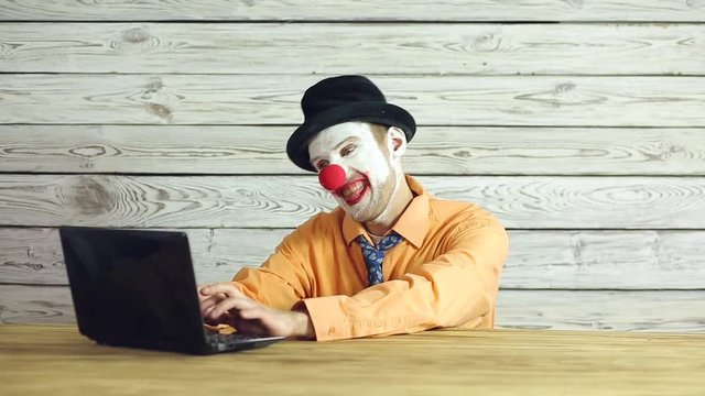 Clown businessman working in the office