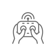 Hands holds remote controller, control panel for drone, gamepad line icon.