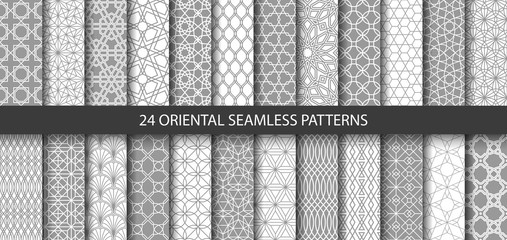 Big set of 24 vector ornamental seamless patterns. Collection of geometric patterns in the oriental style. Patterns added to the swatch panel. - 256384358