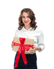 Fototapeta premium Beautiful young woman with gift on white background