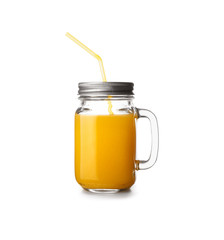 Mason jar of tasty orange juice on white background