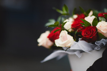 Colorful stylish wedding bouquet of flowers lies on the brown background. Bouquet of the bride.