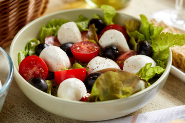 fresh salad with feta cheese and olives