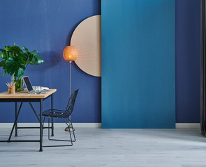 room, wall, working table decoration style in the blue stone wall with orange lamp.