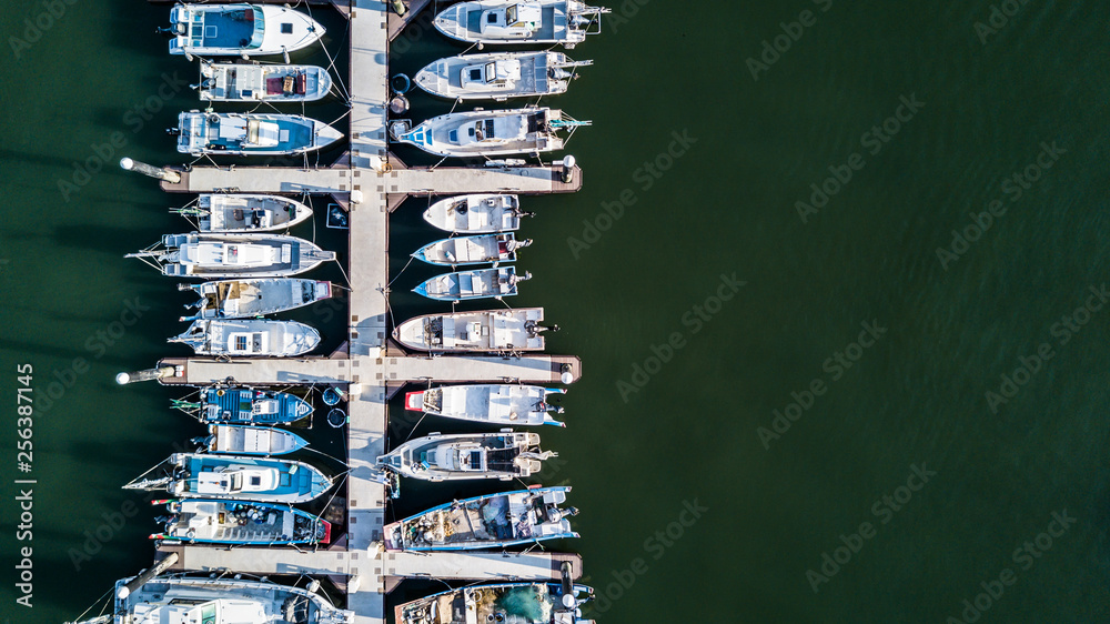 Canvas Prints Yacht parking, A marina lot, Yacht and sailboat is moored at the quay, Aerial view by drone. - Canvas Prints