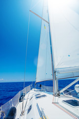 Fototapeta premium Sailing. Ship yachts with white sails in the open Sea.