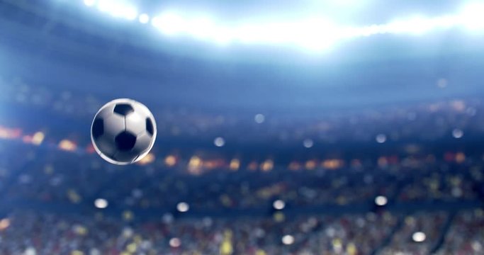 4k footage of a dramatic soccer stadium with ball flying on it. The stadium was made in 3d without using existing references. The crowd and light on the stadium are animated.