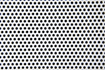 White hole steel pattern background.