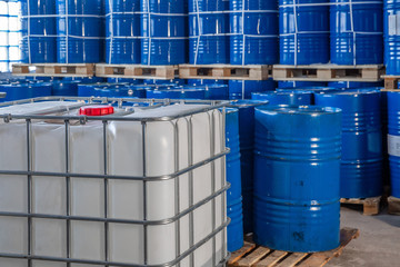 blue barrels in the warehouse on pallets