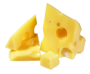 Pieces of sliced cheese on a white background.
