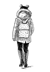 A schoolgirl going to school