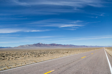 Looking along the Extraterrestrial Highway running through the remote Nevada Desert
