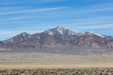 A snowcapped mountain along the Extraterrestrial Highway in remote Nevada