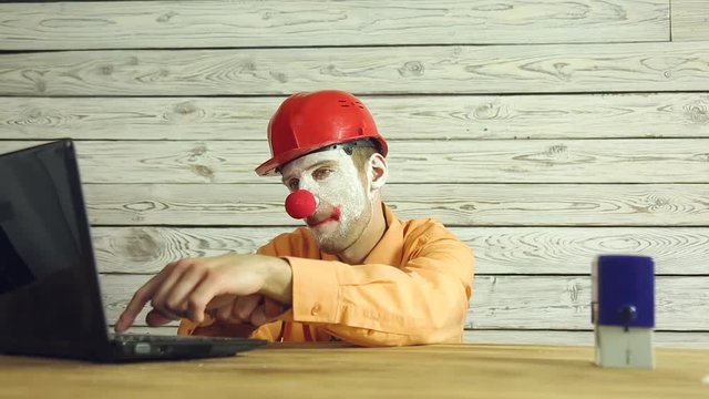 Clown businessman working in the office