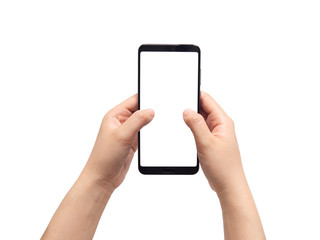 Close up of female hands holding mobile smart phone w/ white blank screen isolated on white background. Touch on screen by finger for chatting, playing game or reading something. Mock up. Copy space.