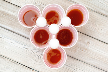Cups for game Beer Pong on the table