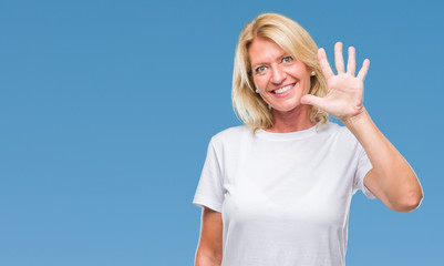 Fototapeta premium Middle age blonde woman over isolated background showing and pointing up with fingers number five while smiling confident and happy.