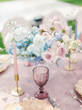 Table setting at a luxury wedding reception. Outdoor wedding