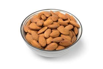 Bowl with peeled almonds close up
