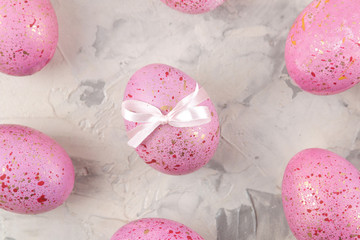 Easter. Pink Easter eggs on a light concrete background. Happy easter. holidays. top view