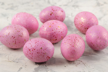 Easter. Pink Easter eggs on a light concrete background. Happy easter. holidays. close-up
