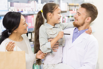 Fototapeta premium Professional pharmacist helping his customers