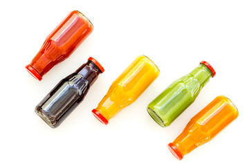 vegetable and fruit juice in bottles for diet drink on white background top view mock up