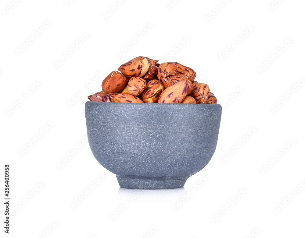 Wall mural nuts in bowl isolated on white background