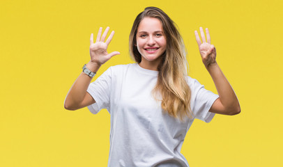 Young beautiful blonde woman wearing casual white t-shirt over isolated background showing and pointing up with fingers number eight while smiling confident and happy.