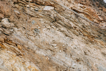 The texture of stones and minerals, in the context of the earth. Stone background for design.