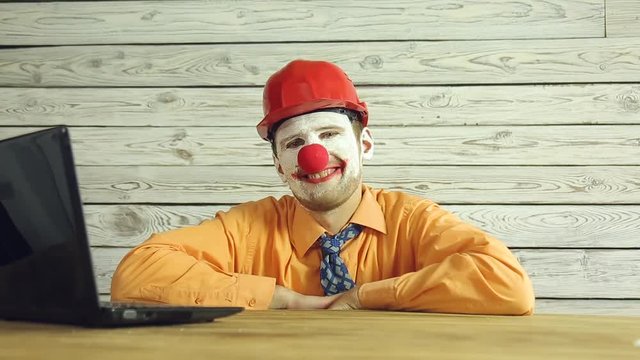 Clown businessman working in the office