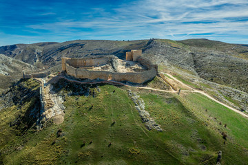 El Burgo de Osma medieval castle and town aerial view in Castille and Leon Spain with blue sky on a sunny day