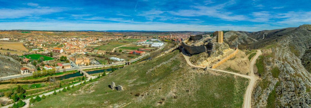 El Burgo de Osma medieval castle and town aerial view in Castille and Leon Spain with blue sky on a sunny day