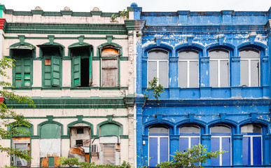 Shabby colorful facade of building, built in the colonial style. Historic center of Kuala Lumpur,...