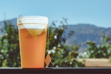 a Cup of tea on a background of mountains