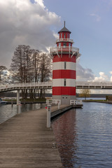 Fototapeta na wymiar Leuchturm Binnen marina Rheinsberg