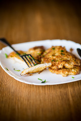 pork fillet chop fried in batter, in a plate