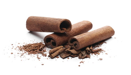 Cinnamon sticks with shavings isolated on white background