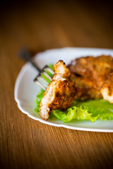 pork fillet chop fried in batter, in a plate