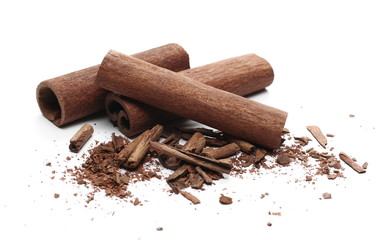 Cinnamon sticks with shavings isolated on white background