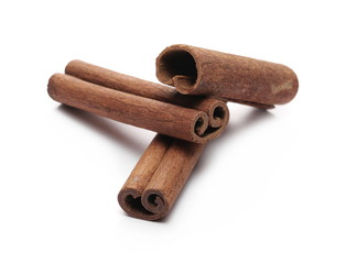 Cinnamon sticks with shavings isolated on white background