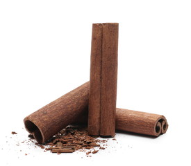 Cinnamon sticks with shavings isolated on white background