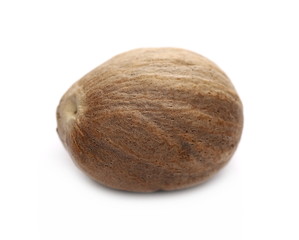 Nutmeg isolated on white background, macro