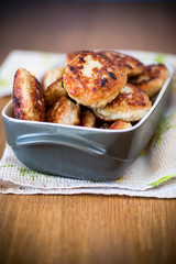 fried meat patties in a ceramic bowl