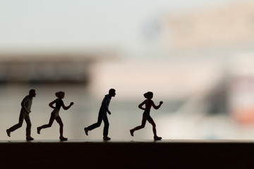 Miniature people: Silhouette of a runner , Health And lifestyle concepts.