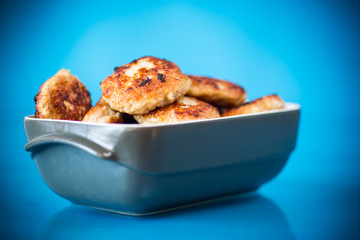 fried meat patties in a ceramic bowl