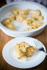 baked cauliflower with spices in ceramic form